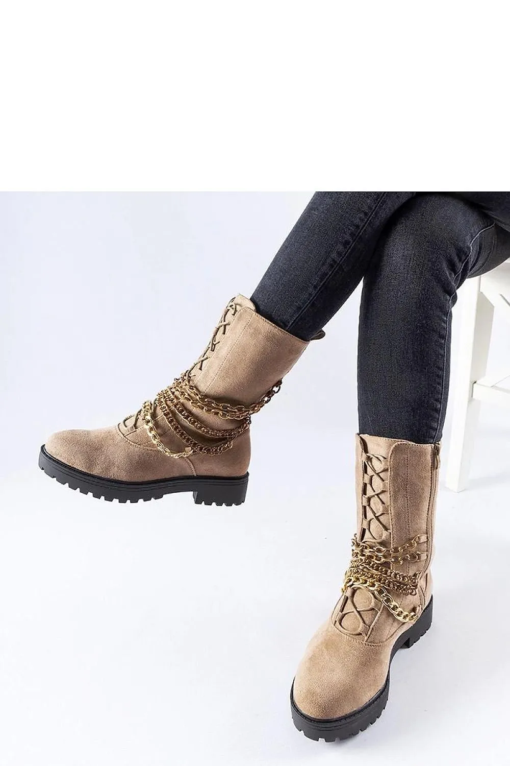 Beige insulated ankle boots with a chain